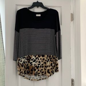 Maurices multi colored top with 3/4 length sleeves. Size L